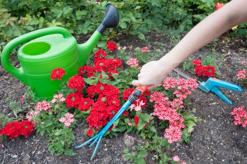 Gardeners preparing soil in Colebee